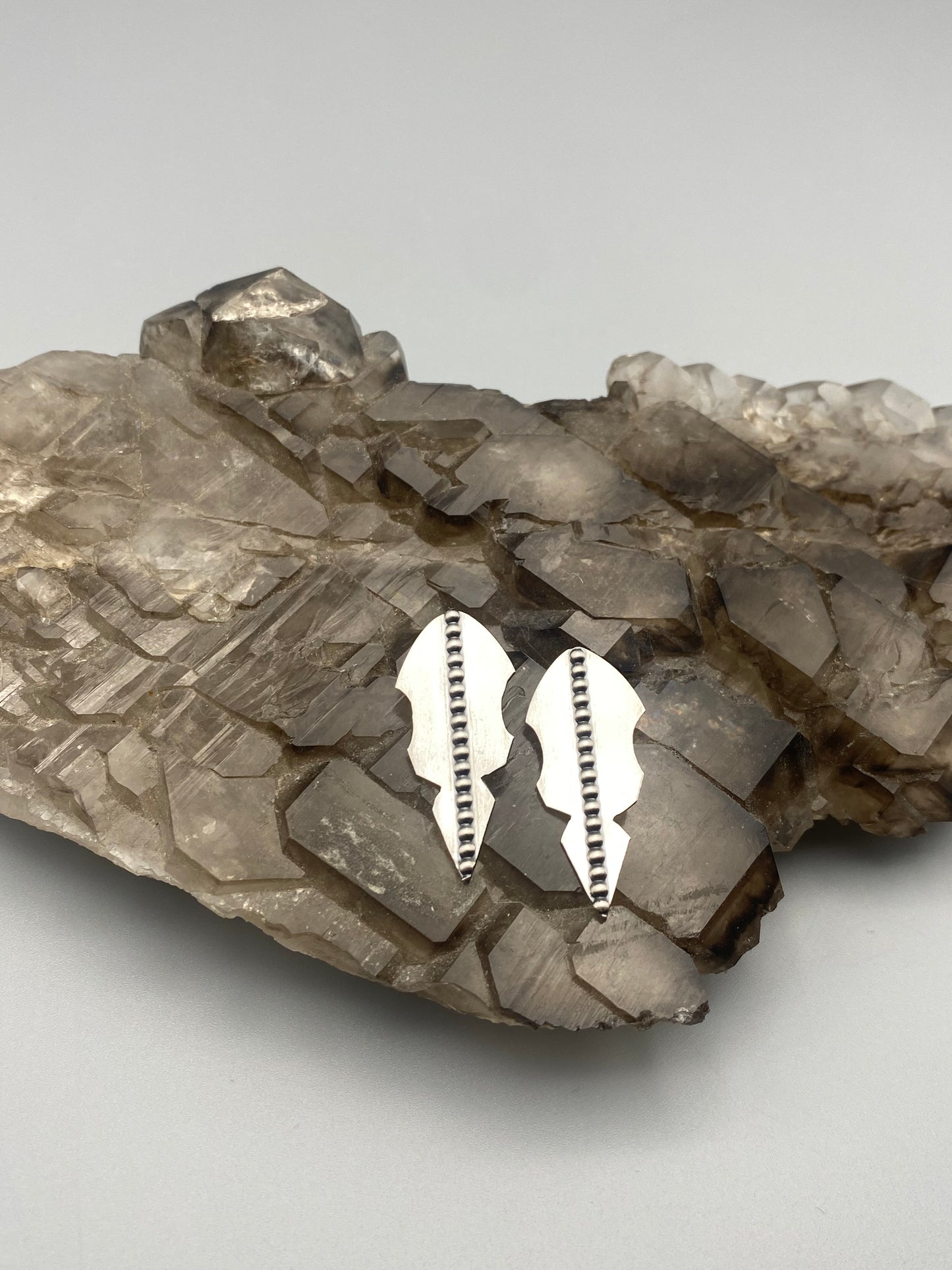 shield studs 01